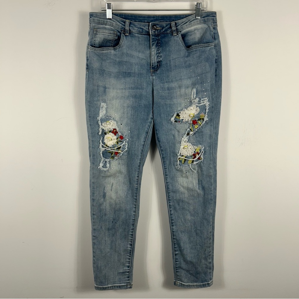 Distressed Blue Jeans with Floral Accents